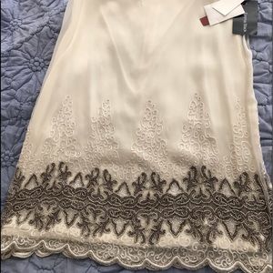 Emma Black silk, scalloped bottom skirt.